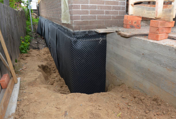 Happy homeowners after waterproofing job in Lawnside